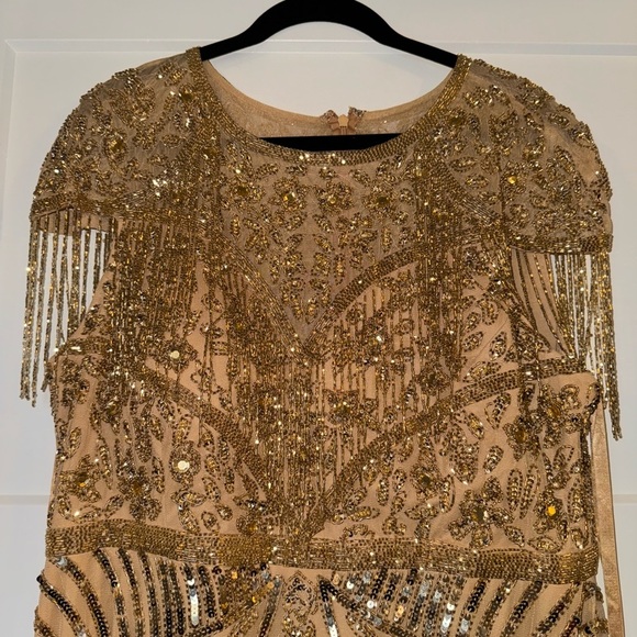 MAC DUGGAL
Gold Embellished Fringe Cap Sleeve Trumpet
Gown | 4715 | 6 - Picture 6 of 14